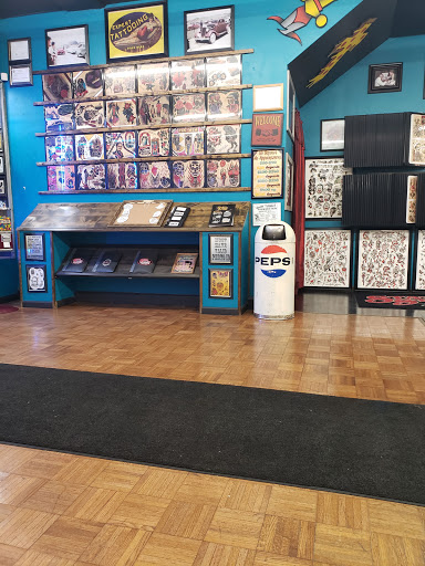 Explore wrestling tattoo ideas, creative tattoo ideas in Salem, available at State Street Tattoo