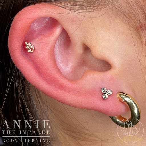 Find tattoos ideas on leg for your next unique tattoo in Bloomington at Crystal Moon Body Arts