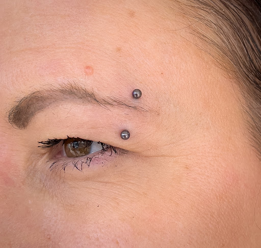 Explore tattoo cover up ideas for females, creative tattoo ideas in West Palm Beach, available at Wooden Heart Tattoos and Piercings