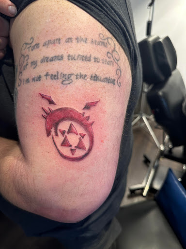 Explore tattoo ideas for women's wrist, creative tattoo ideas in Bridgeport, available at Pike Street Studios Tattoo and Body Piercing