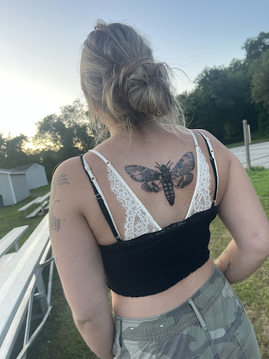 Explore slash tattoo ideas, creative tattoo ideas in Salem, available at Azappa Tattoo and Piercing