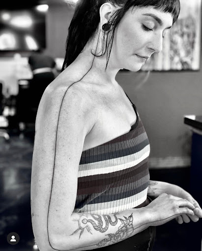 Explore bass fishing tattoo ideas, creative tattoo ideas in Portsmouth, available at World Famous Blue Horseshoe Tattoo and Piercing