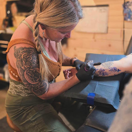 Explore bass tattoo ideas, creative tattoo ideas in Florissant, available at Lone Jack Tattoo Company