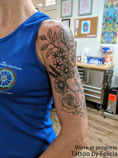 Explore collarbone tattoo ideas, creative tattoo ideas in Fort Myers, available at Tiger Lotus Tattoo and Piercing