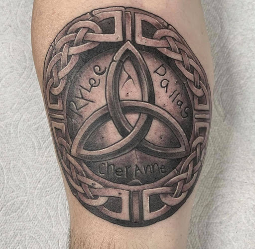 Find surrealism tattoo ideas for your next unique tattoo in Canton at Couture Tattoo and Body Piercing