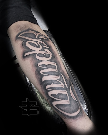 Explore name design tattoo ideas, creative tattoo ideas in Canoga Park, available at Nathans Tattoos and Piercings