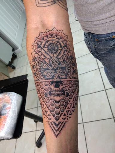 Explore male chest tattoo ideas, creative tattoo ideas in Milan, available at Apocalyptic Ink Studio