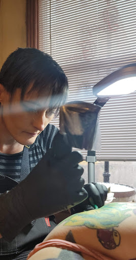 Explore blue rose tattoo ideas, creative tattoo ideas in Meadville, available at Lucky Lucys Tattoo and Art Studio