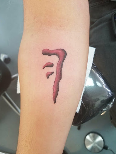 Explore tattoo ideas for brothers death, creative tattoo ideas in Fort Myers, available at Tiger Lotus Tattoo and Piercing