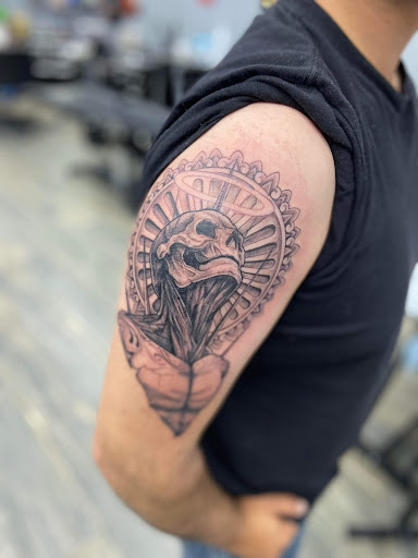 Explore hood neck tattoos ideas, creative tattoo ideas in El Paso, available at American Tattoo Society of Ft Bliss