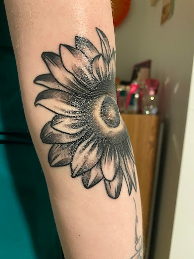 Explore throat tattoo ideas, creative tattoo ideas in Lakewood, available at Aces and Eights Tattoo