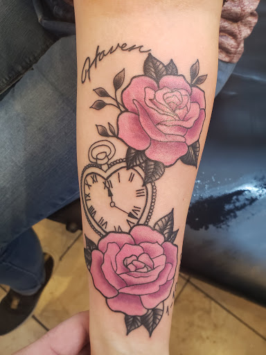 Explore male wedding ring tattoo ideas, creative tattoo ideas in Owensboro, available at Lady Luck Tattoo and Body Piercing