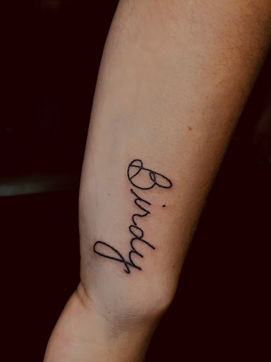 Explore hopeless romantic tattoo ideas, creative tattoo ideas in North Tonawanda, available at Dark Side Ink Tattoo Studio