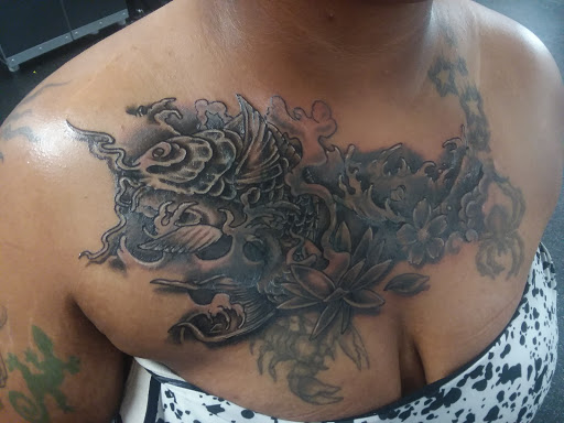 Explore puzzle tattoos ideas, creative tattoo ideas in Tifton, available at Embody Art Tattoo Studio