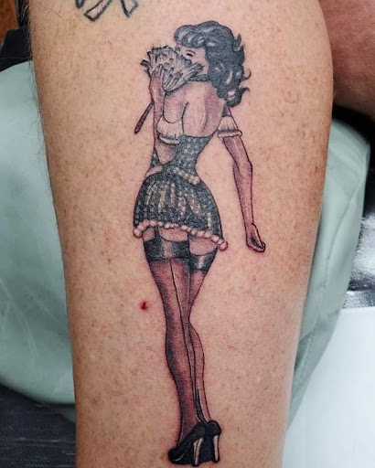 Explore upper arm tattoo ideas for men, creative tattoo ideas in Shelbyville, available at Stage Left Tattoo and Piercing