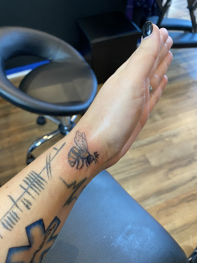 Explore neck tattoo ideas for females, creative tattoo ideas in Lexington, available at Bleed Blue Ink