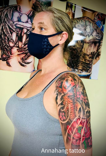 Explore hand tattoo ideas, creative tattoo ideas in Garden Grove, available at Anna Hang Tattoo