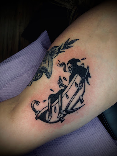 Explore couple name tattoo ideas, creative tattoo ideas in North Tonawanda, available at Dark Side Ink Tattoo Studio