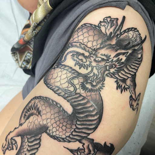 Explore dark humor tattoo ideas, creative tattoo ideas in Buffalo, available at True Gloom Tattoo Studio