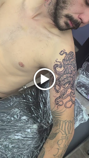 Explore colored tattoo sleeve ideas, creative tattoo ideas in Helena, available at Legacy Ink