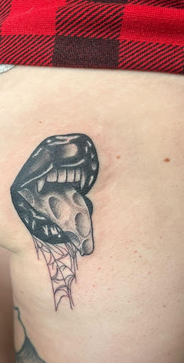 Explore tattoos ideas for hands, creative tattoo ideas in Forest Lake, available at Electric Blue Tattoo Co.