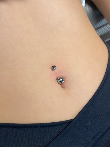 Explore forearm flower tattoo ideas, creative tattoo ideas in Springfield, available at Body Piercing By Qui Qui