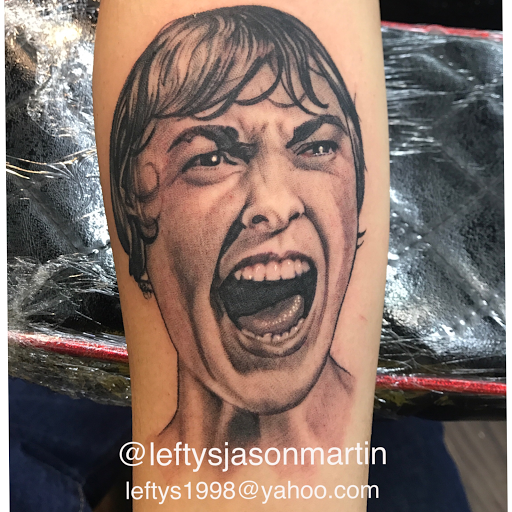 Explore orchid tattoo ideas, creative tattoo ideas in Orange, available at Leftys Tattoo