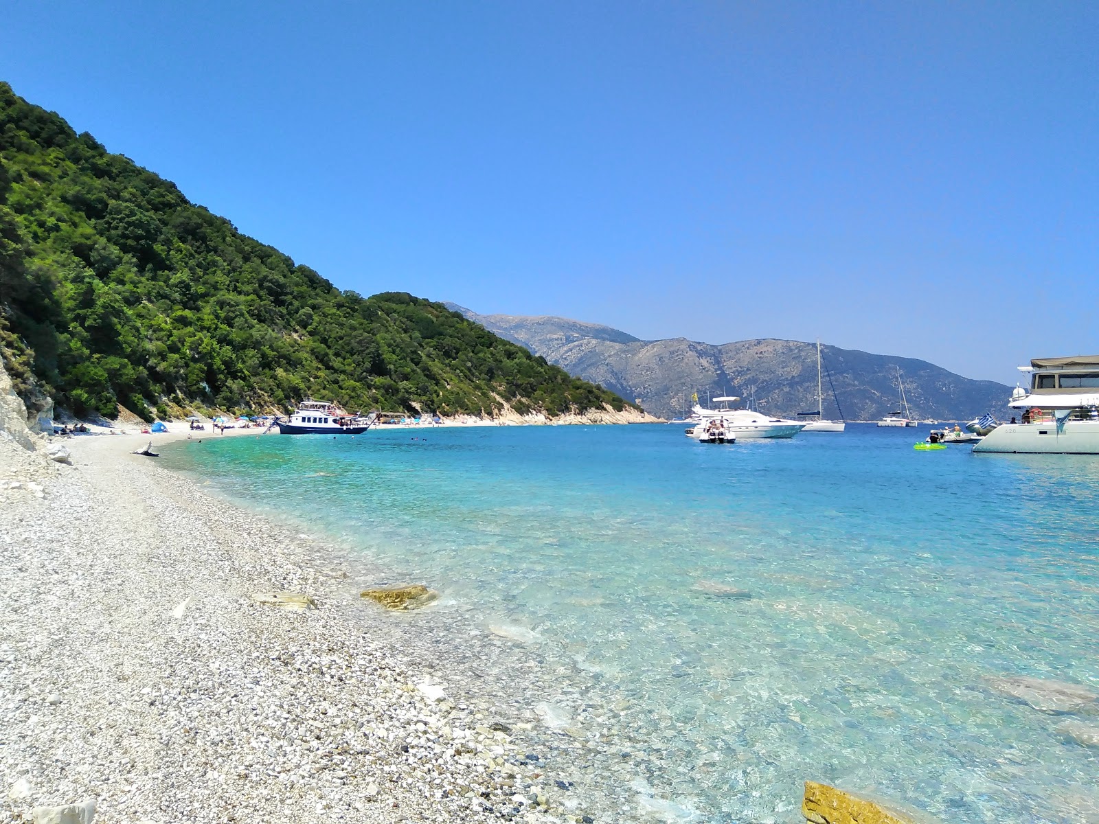 Photo of Gidaki beach with turquoise pure water surface