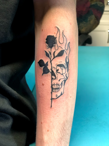 Explore simple neck tattoo ideas, creative tattoo ideas in Shippensburg, available at Guerilla Tattoo