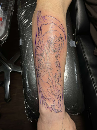 Explore tattoo ideas for adoption, creative tattoo ideas in Davenport, available at Tooth & Nail Tattoo & Piercing