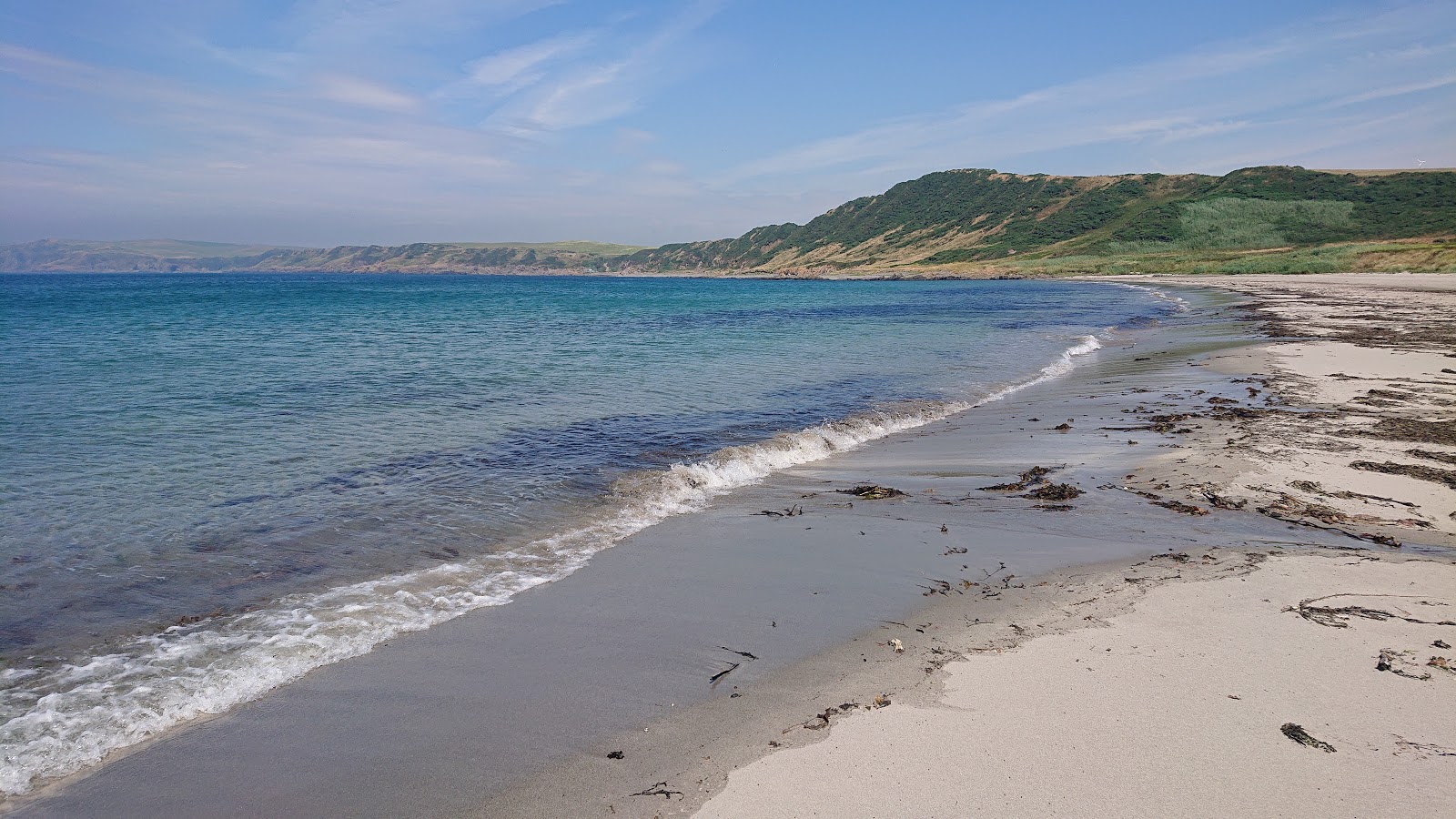 Zdjęcie Ardwell Bay Beach z powierzchnią beżowy piasek