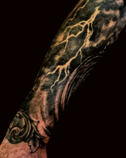 Find lesbian couple tattoos ideas for your next unique tattoo in Stowe at World Famous Monkey House Customs