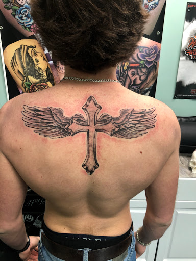 Explore to infinity and beyond tattoo ideas, creative tattoo ideas in Meridian, available at Creative Pain Tattoo Studio
