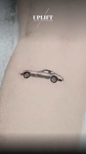 Explore tattoo ideas on belly, creative tattoo ideas in New York, available at UPLIFT TATTOO & PIERCING NYC