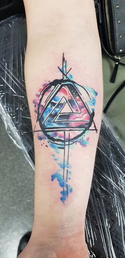 Explore peck tattoo ideas, creative tattoo ideas in Springfield, available at Area 51 Tattoo
