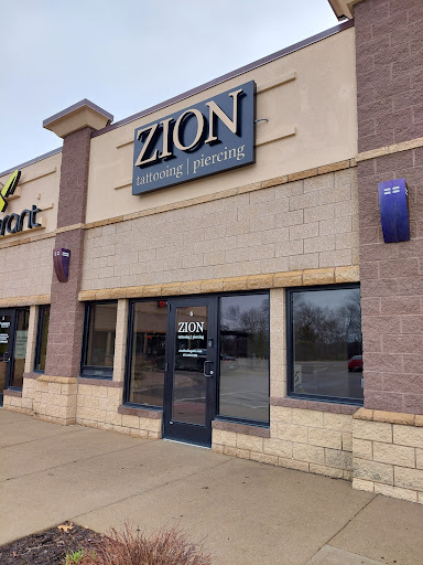 Explore saturn tattoo ideas, creative tattoo ideas in Farmington, available at Zion Tattooing & Piercing