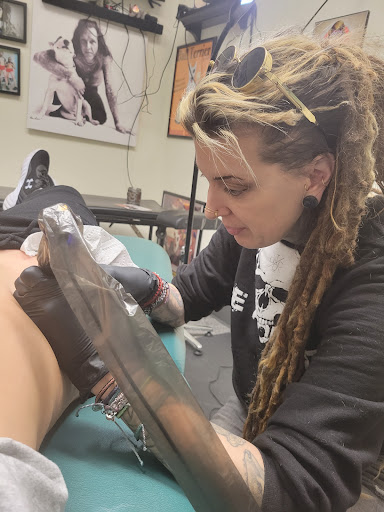 Find tattoo ideas moth for your next unique tattoo in Saint Paul at Iron Rhino Tattoo