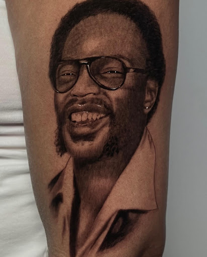 Explore full neck tattoo ideas for men, creative tattoo ideas in Montgomery, available at Flying Eye Tattoo Studio