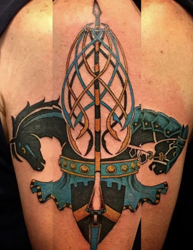 Explore thigh tattoo ideas for females, creative tattoo ideas in New Orleans, available at Downtown Tattoos and Piercing