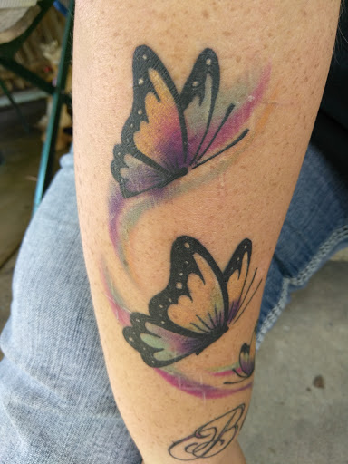 Explore fire tattoos ideas, creative tattoo ideas in Jacksonville, available at Fat Kat Tattoo & Body Piercing