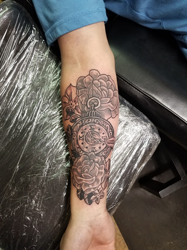 Explore inside ear tattoos ideas, creative tattoo ideas in Conway, available at Primal Urge Tattoos