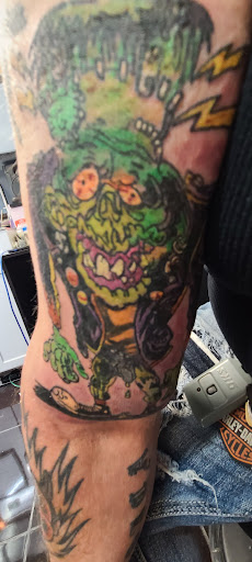 Explore open book tattoo ideas, creative tattoo ideas in Nashville, available at Bellevue Tattoo Emporium