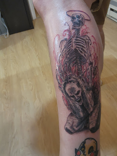 Explore religious tattoo ideas, creative tattoo ideas in Covington, available at Illuminaut Tattoo