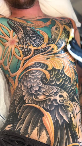 Explore wing tattoo ideas for guys, creative tattoo ideas in San Diego, available at Guru Tattoo