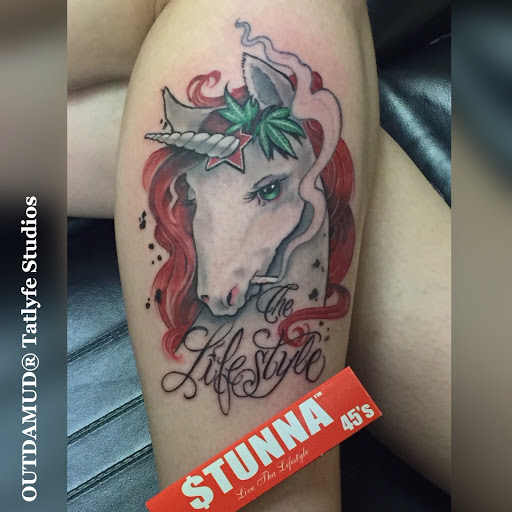 Explore small lion tattoo ideas, creative tattoo ideas in Savannah, available at Tatlyfe Studios