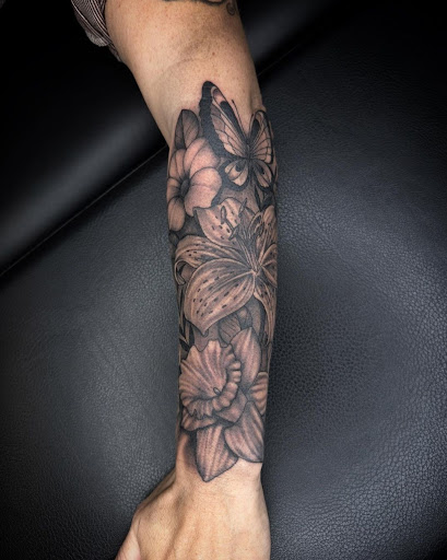 Explore red ink tattoo ideas for guys, creative tattoo ideas in Eugene, available at High Priestess Piercing & Tattoo