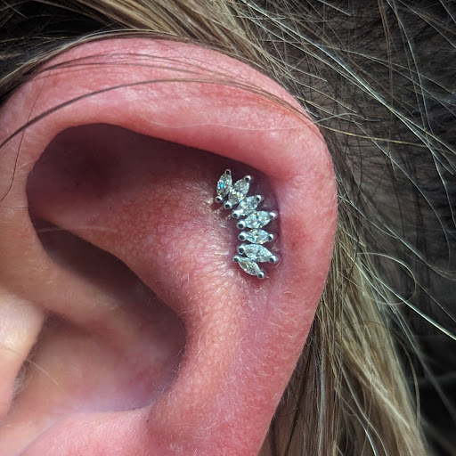 Explore marigold tattoo ideas, creative tattoo ideas in Mesa, available at Club Tattoo