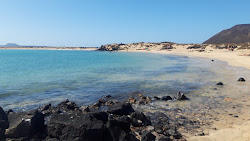 Photo de Playa De La Concha De Lobos situé dans une zone naturelle