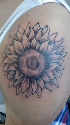 Explore musical tattoo ideas, creative tattoo ideas in Ventura, available at JDs Tattoos