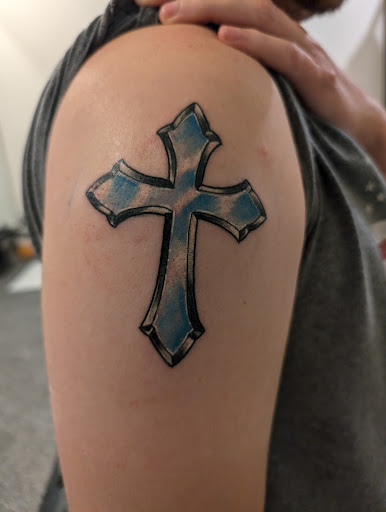 Explore medium tattoo ideas for females, creative tattoo ideas in Rogers, available at Saved by Grace Tattoo Studio